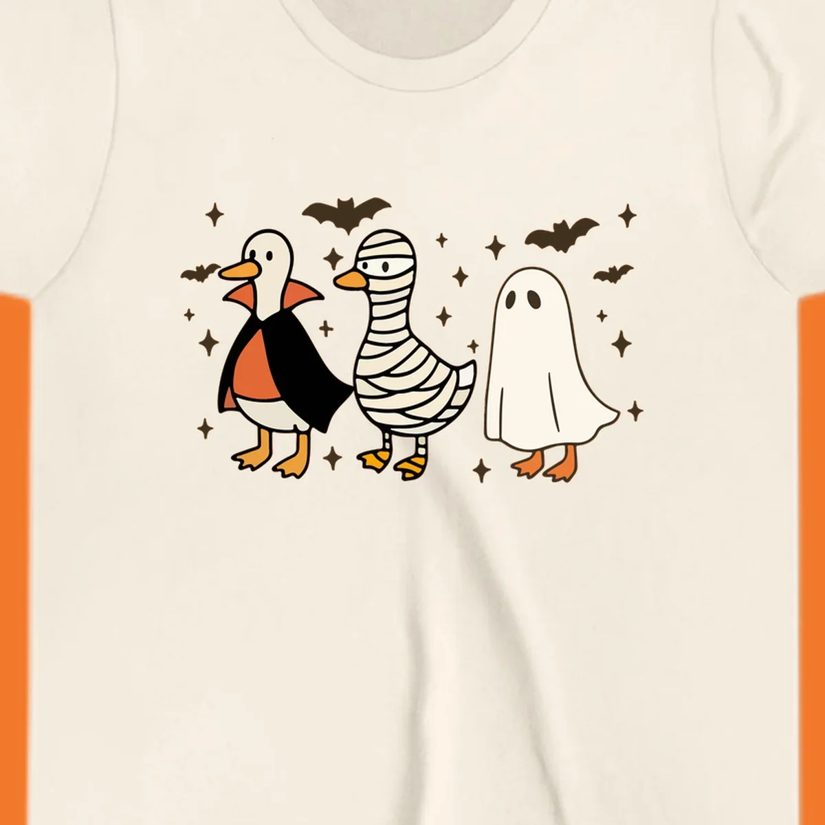 Halloween duck trio in costumes: vampire, mummy, and ghost. holiday-duck-trio.