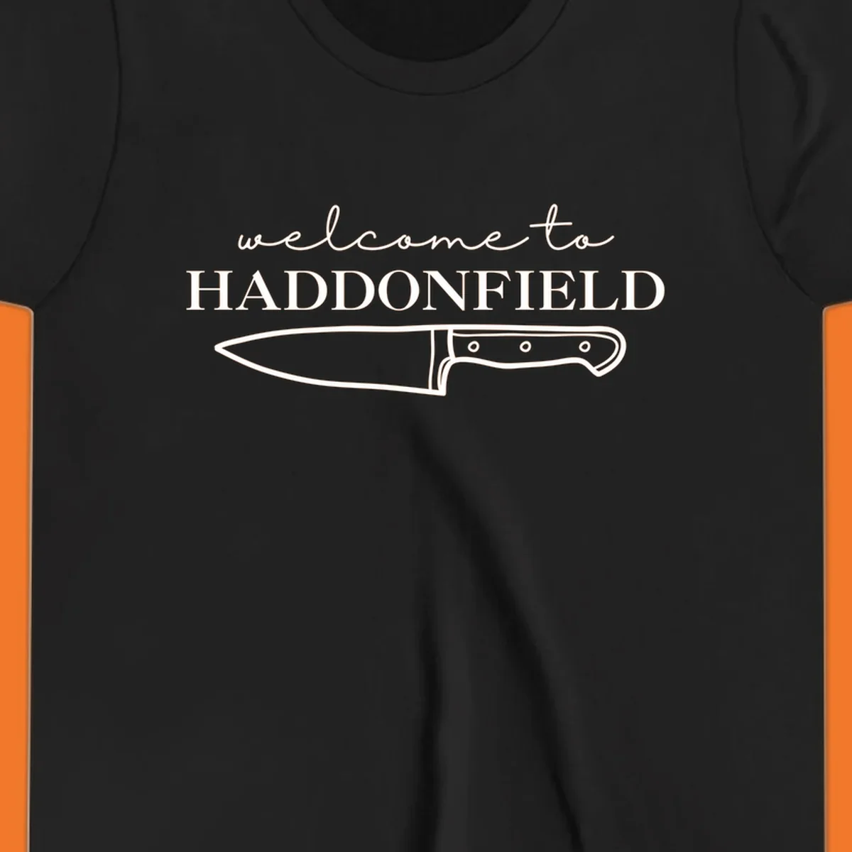 Welcome to Haddonfield text with a knife illustration, Halloween horror movie theme.