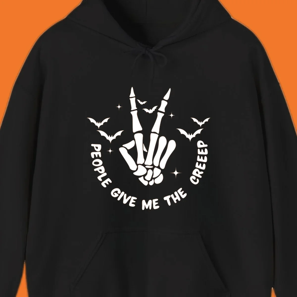 Skeleton hand peace sign with bats and text 'People Give Me The Creeper', Halloween creeper hand design.