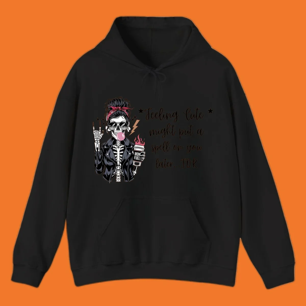Skeleton mom blowing bubble gum with 'Mom Fuel' coffee, text 'Feeling Cute might put a spell on you later...IDK', halloween graphic.