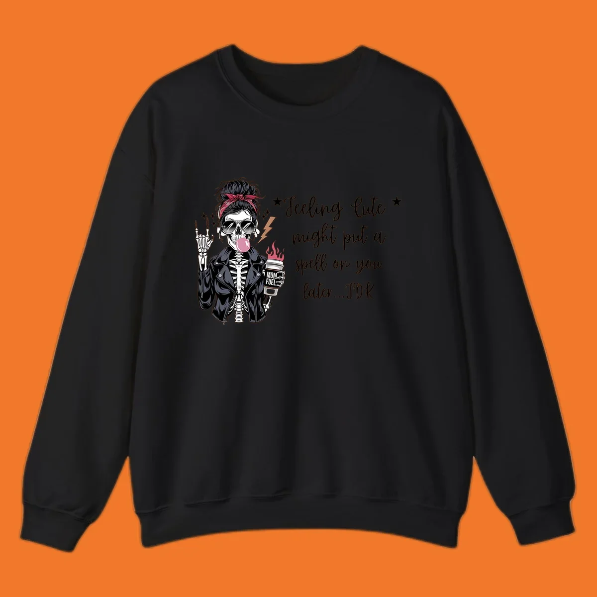 Skeleton mom blowing bubble gum with 'Mom Fuel' coffee, text 'Feeling Cute might put a spell on you later...IDK', halloween graphic.