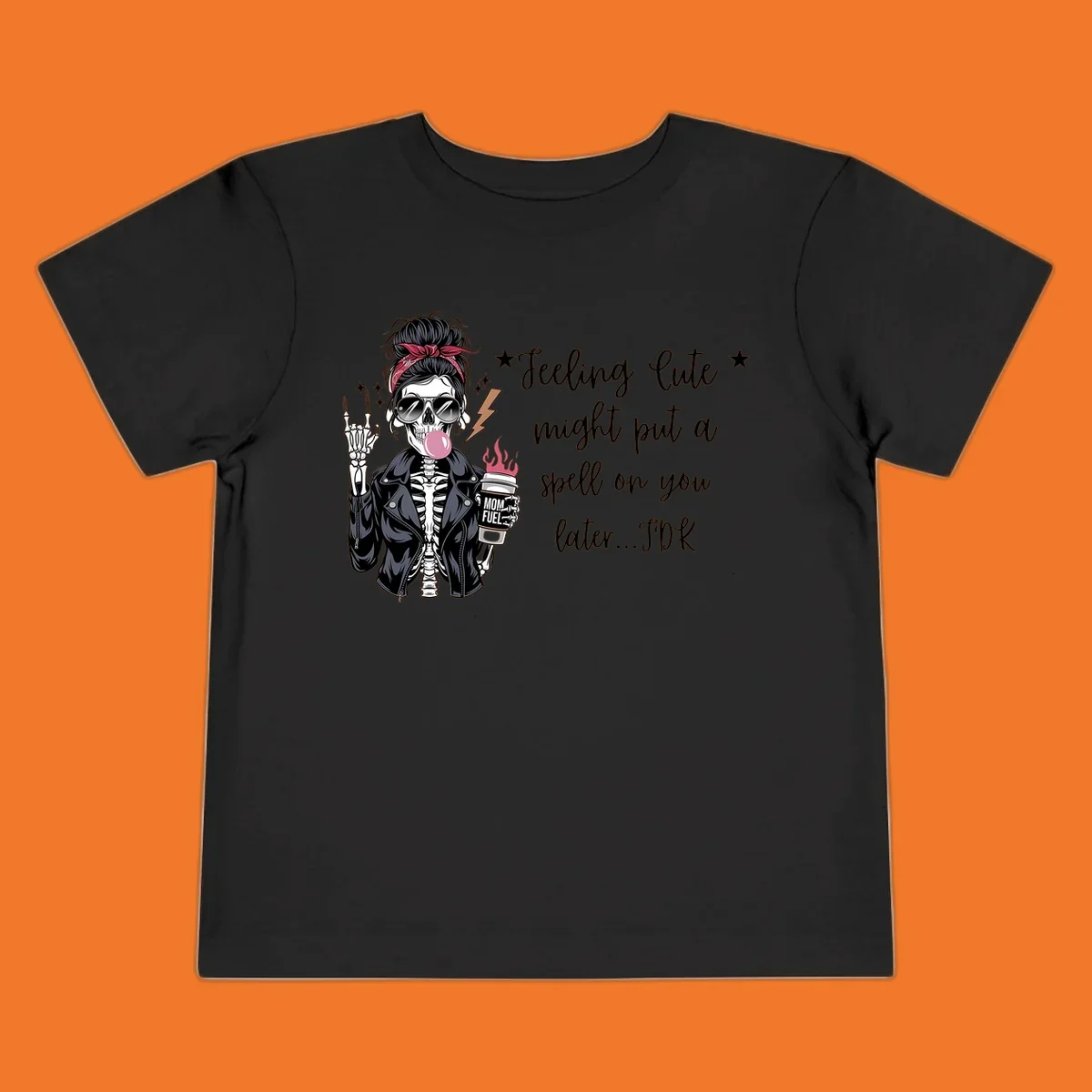 Skeleton mom blowing bubble gum with 'Mom Fuel' coffee, text 'Feeling Cute might put a spell on you later...IDK', halloween graphic.