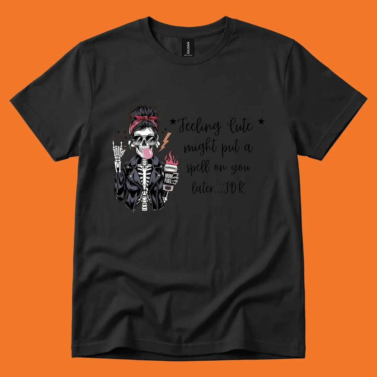 Skeleton mom blowing bubble gum with 'Mom Fuel' coffee, text 'Feeling Cute might put a spell on you later...IDK', halloween graphic.
