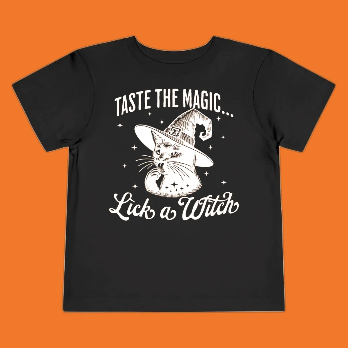 Illustration of a witch cat with text 'Taste The Magic... Lick a Witch', featuring the lick-a-witch-cat concept.