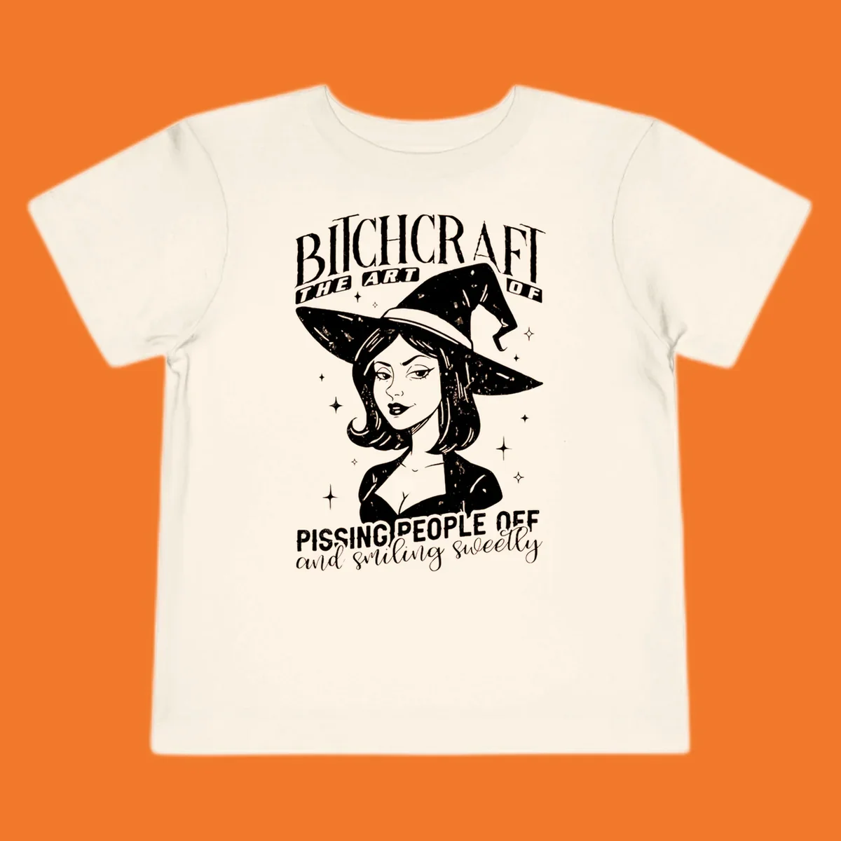 Illustration of a witch with the text Bitchcraft The Art Of Pissing People Off and smiling sweetly.