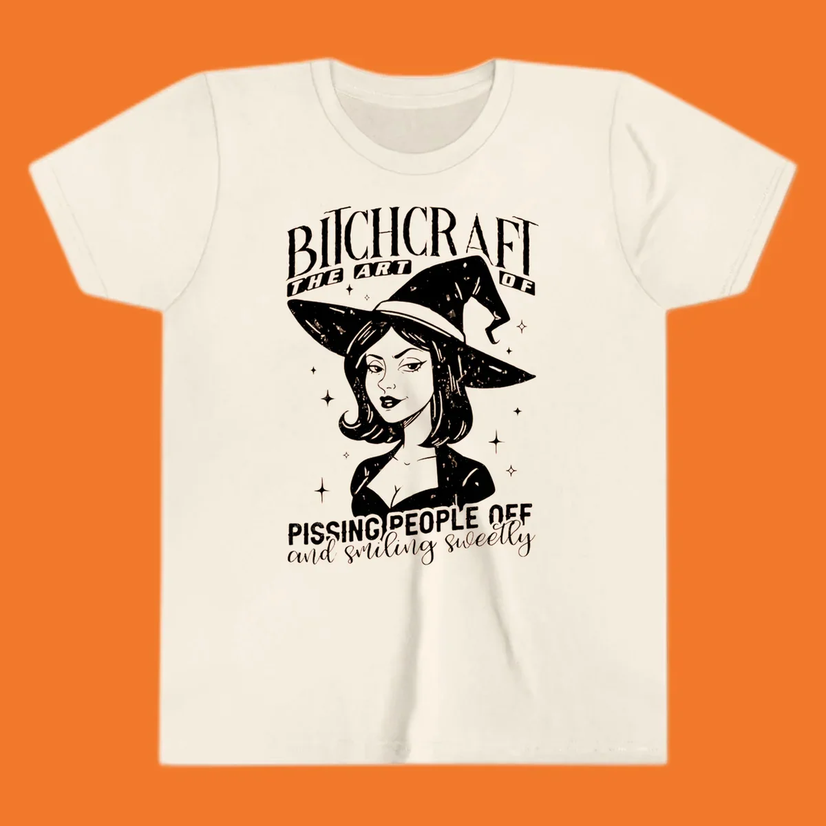 Illustration of a witch with the text Bitchcraft The Art Of Pissing People Off and smiling sweetly.
