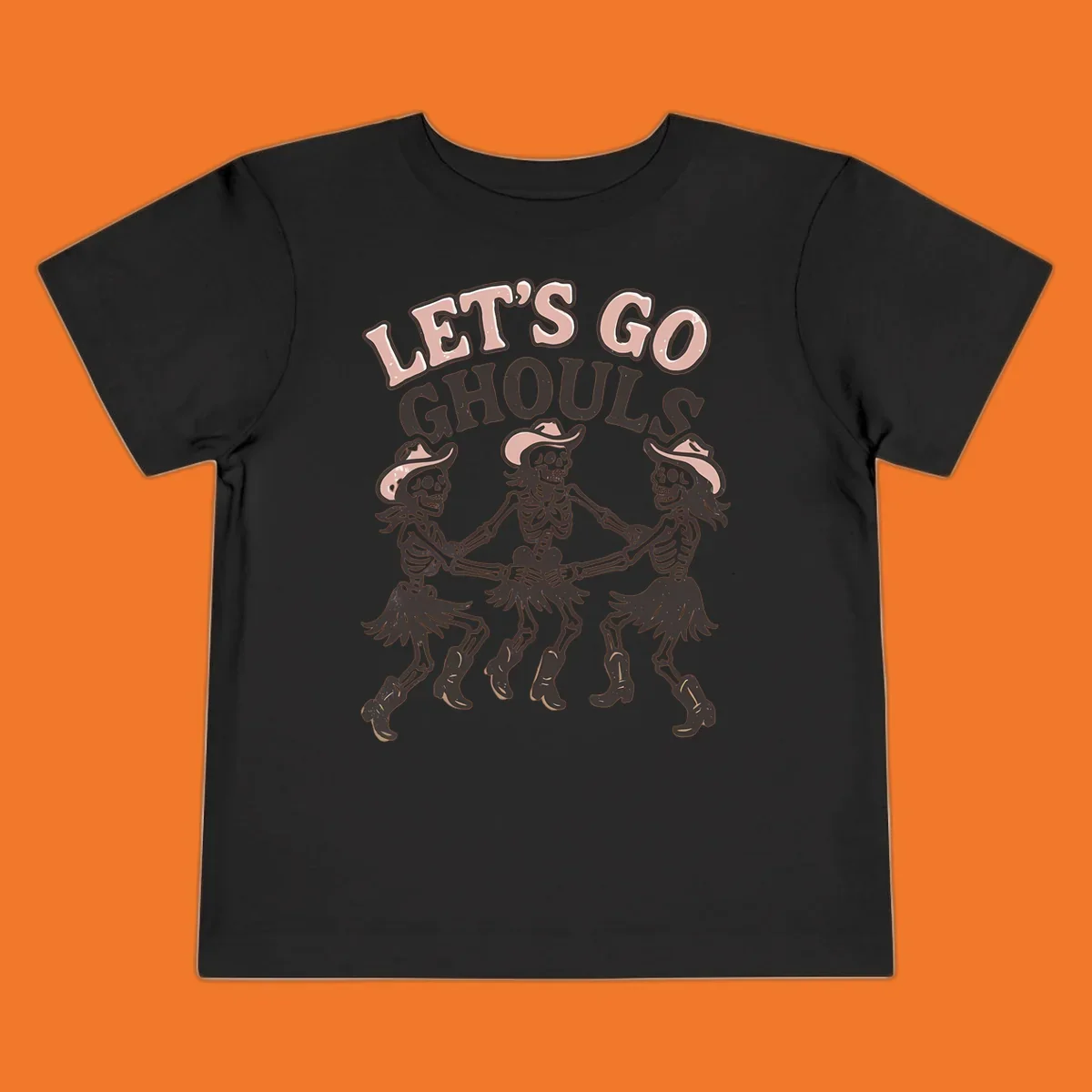 Lets Go Ghouls text with three dancing skeletons in cowboy attire.