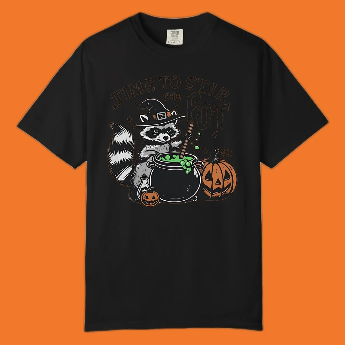Raccoon witch stirring a halloween pot, text says TIME TO STIR THE POT.