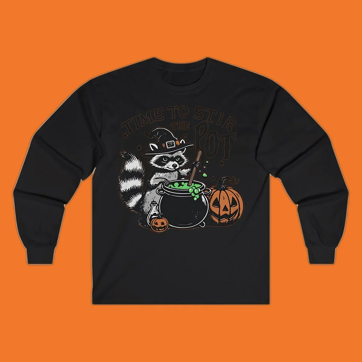 Raccoon witch stirring a halloween pot, text says TIME TO STIR THE POT.
