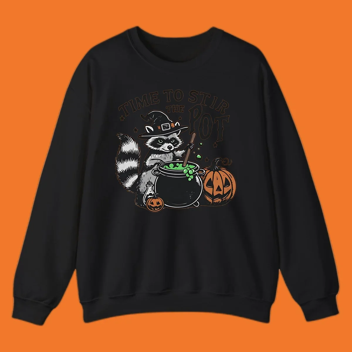 Raccoon witch stirring a halloween pot, text says TIME TO STIR THE POT.