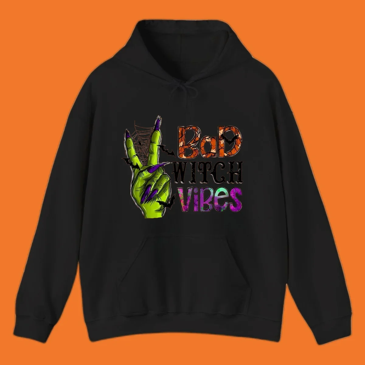 Bad Witch Vibes Halloween graphic with a green witch hand peace sign and bats.