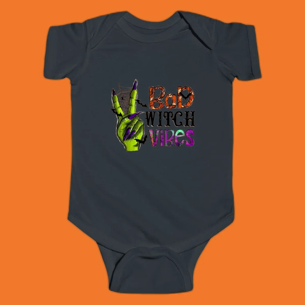 Bad Witch Vibes Halloween graphic with a green witch hand peace sign and bats.