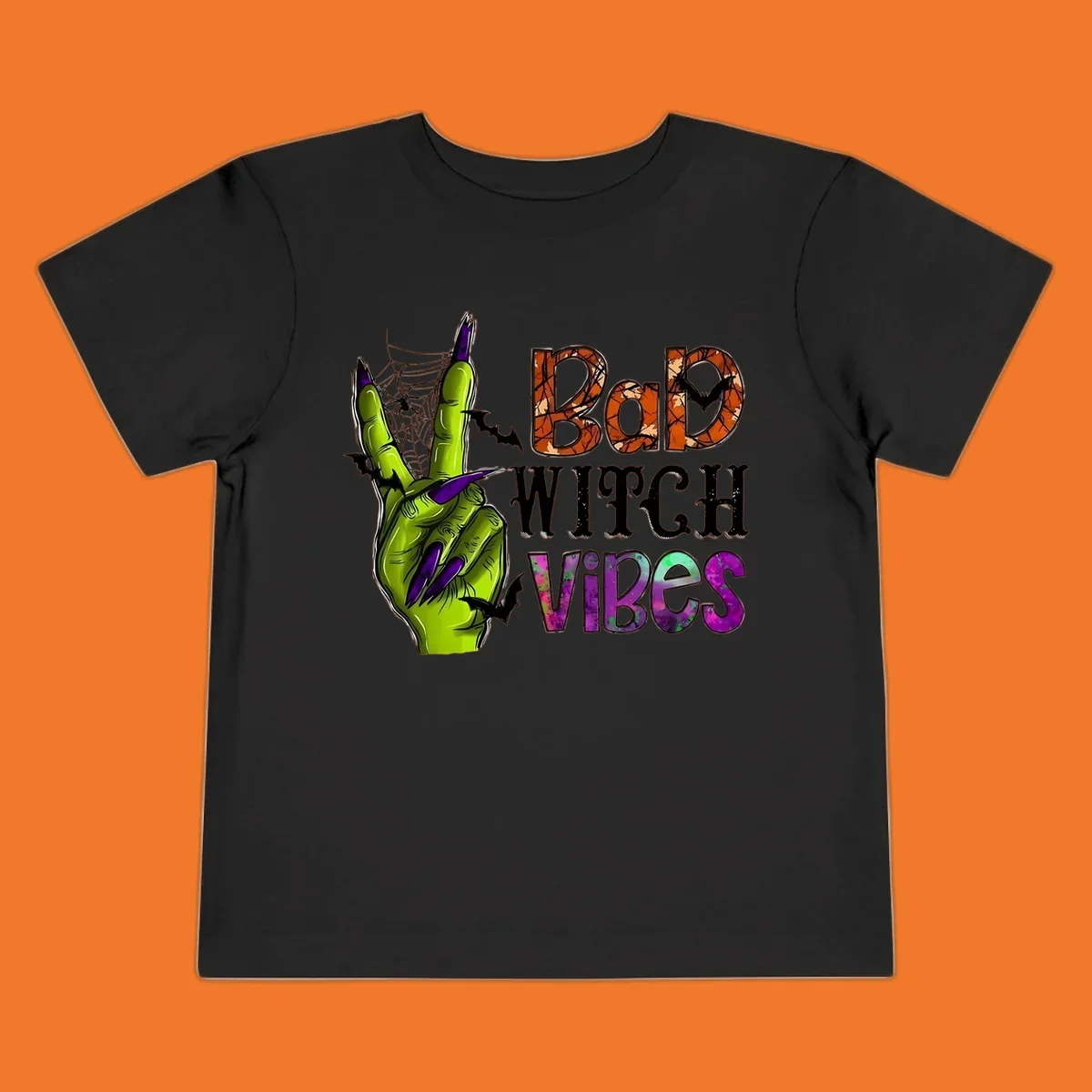 Bad Witch Vibes Halloween graphic with a green witch hand peace sign and bats.