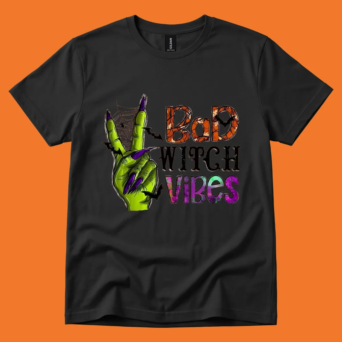 Bad Witch Vibes Halloween graphic with a green witch hand peace sign and bats.