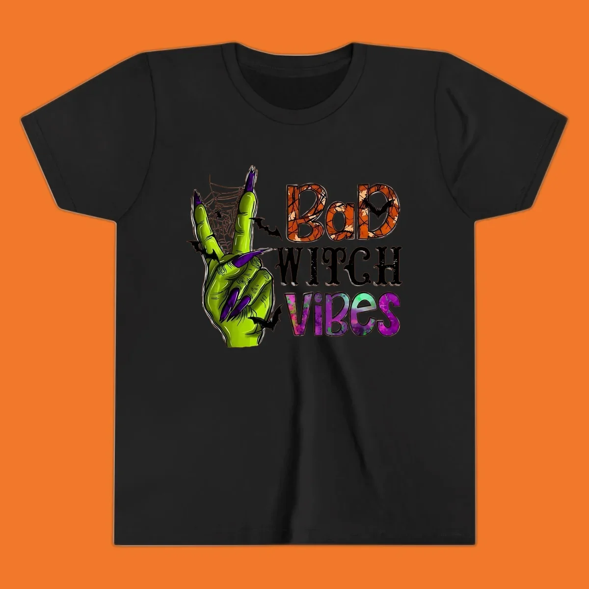 Bad Witch Vibes Halloween graphic with a green witch hand peace sign and bats.