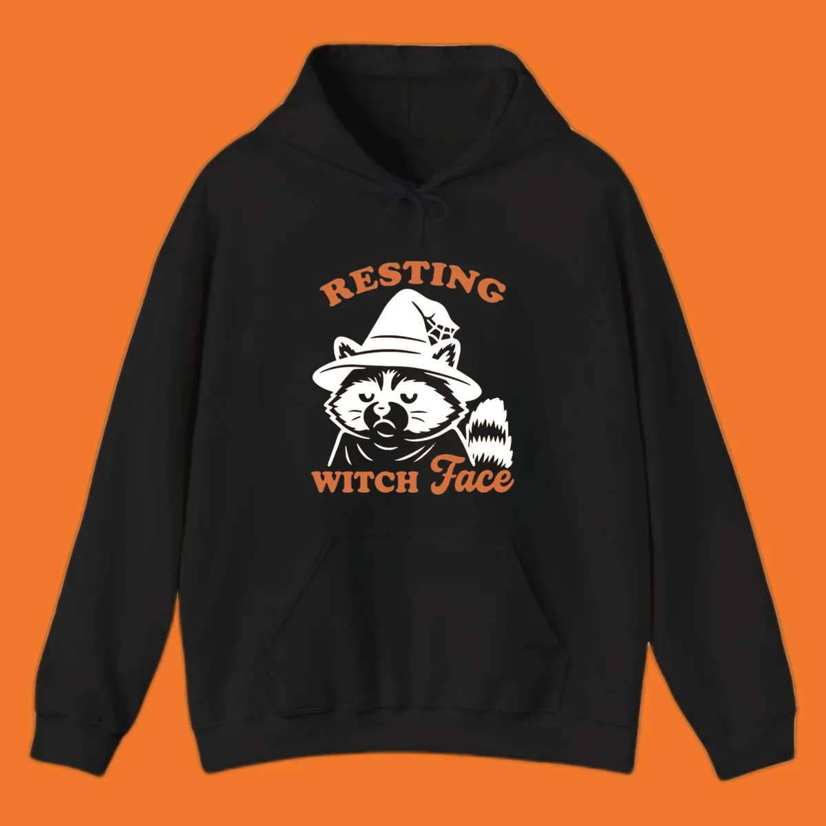 Resting Witch Face raccoon Halloween design with text.