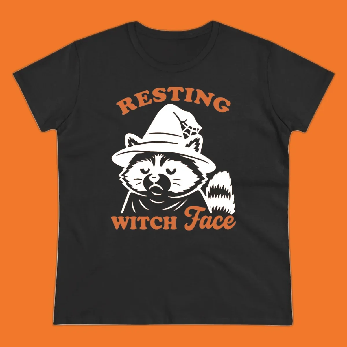 Resting Witch Face raccoon Halloween design with text.