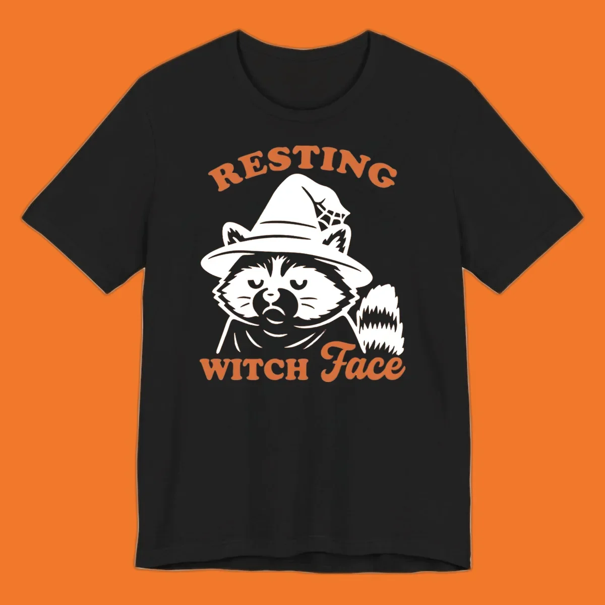 Resting Witch Face raccoon Halloween design with text.