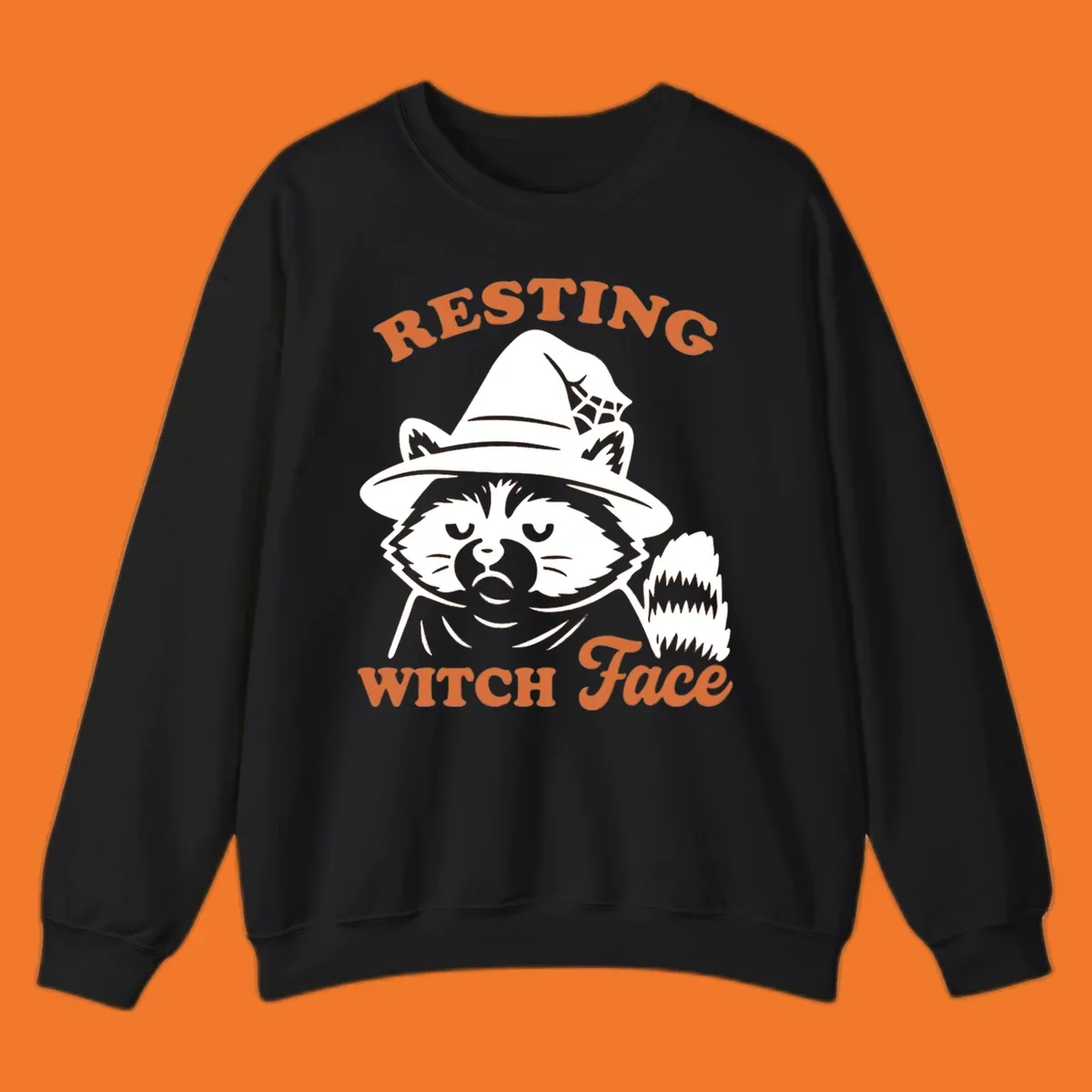Resting Witch Face raccoon Halloween design with text.