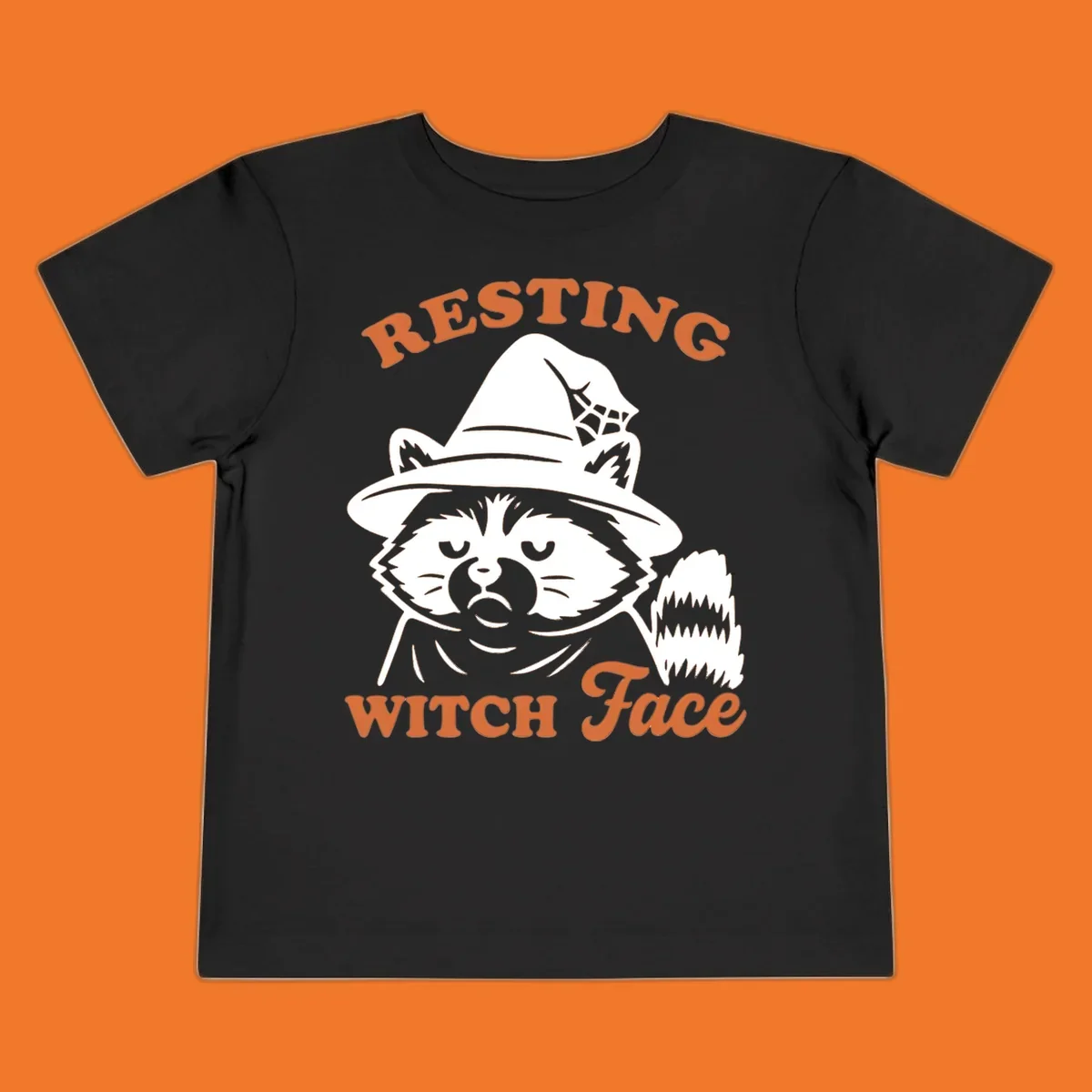 Resting Witch Face raccoon Halloween design with text.