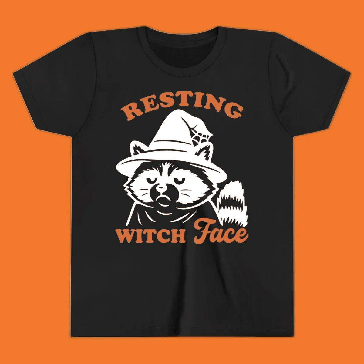 Resting Witch Face raccoon Halloween design with text.