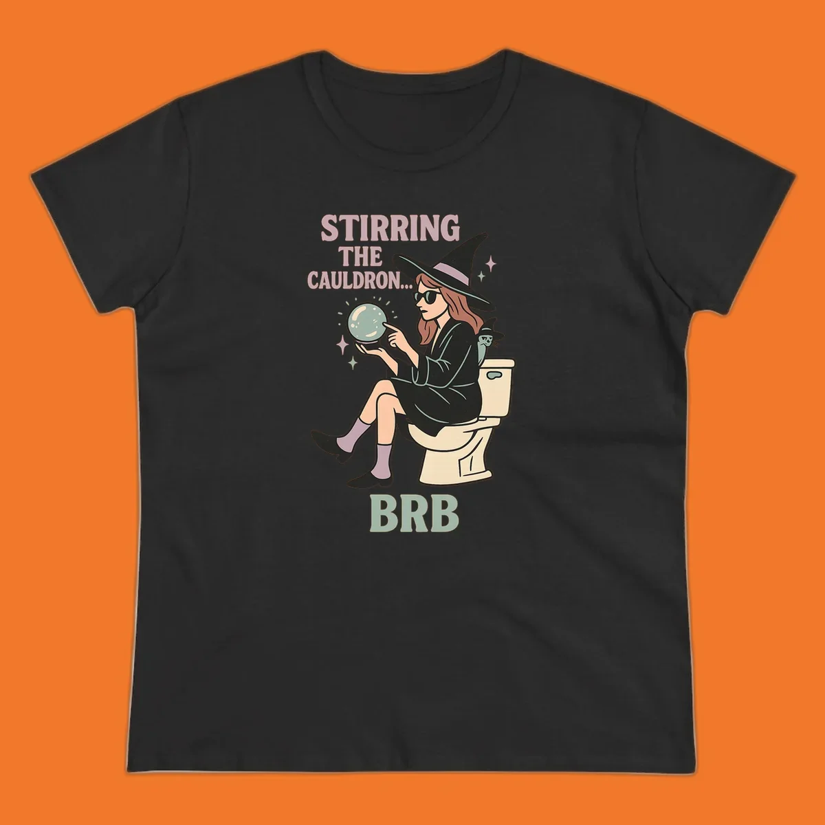 Witch sitting on toilet with crystal ball, text says Stirring The Cauldron BRB.