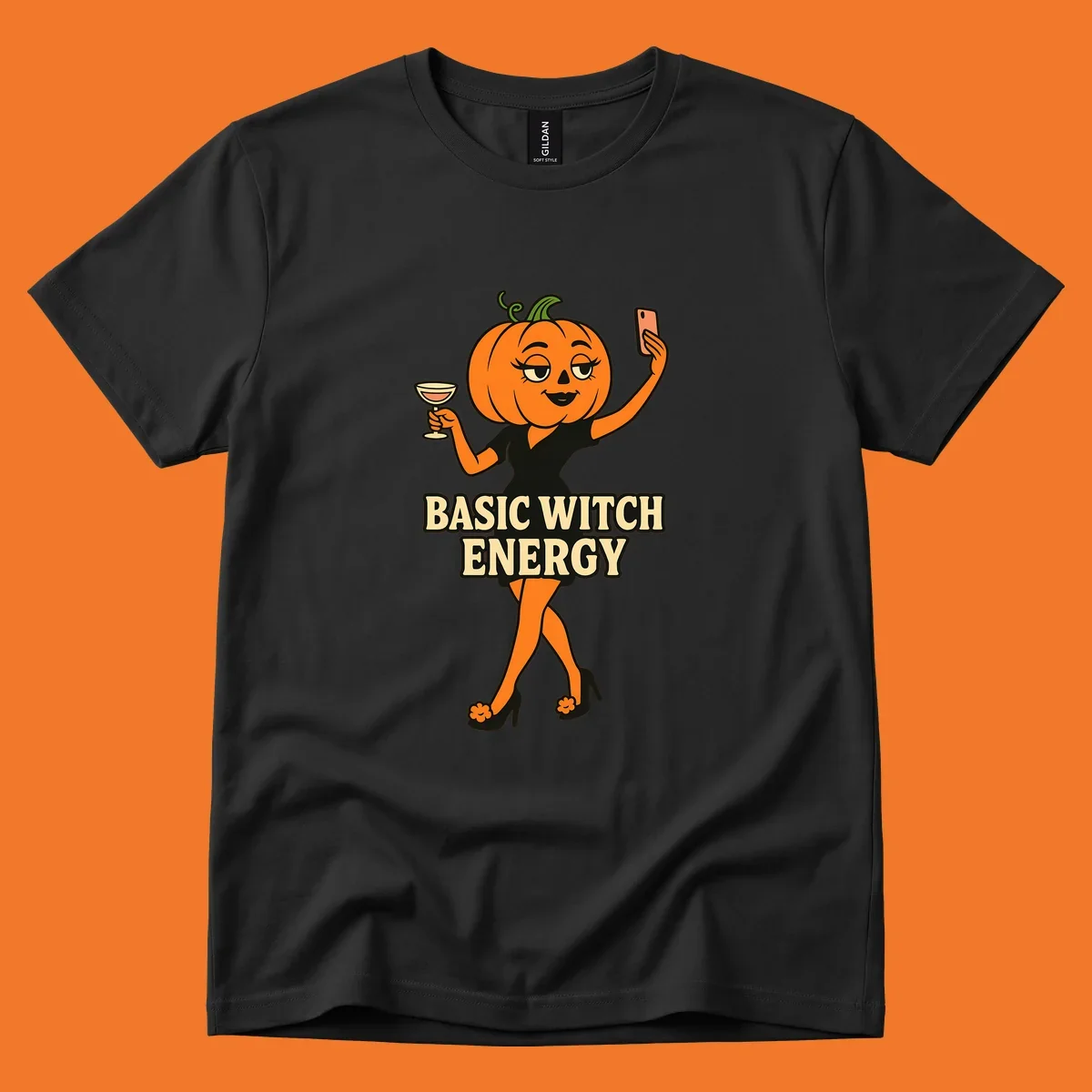 Pumpkin character with 'BASIC WITCH ENERGY' text, holding a cocktail and phone for a selfie.