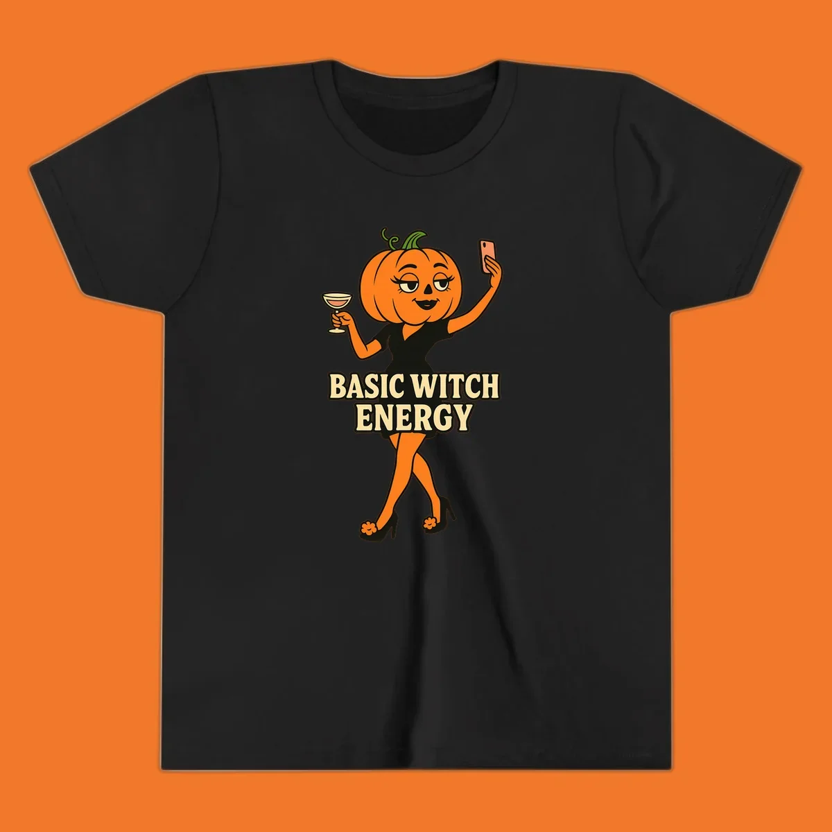 Pumpkin character with 'BASIC WITCH ENERGY' text, holding a cocktail and phone for a selfie.