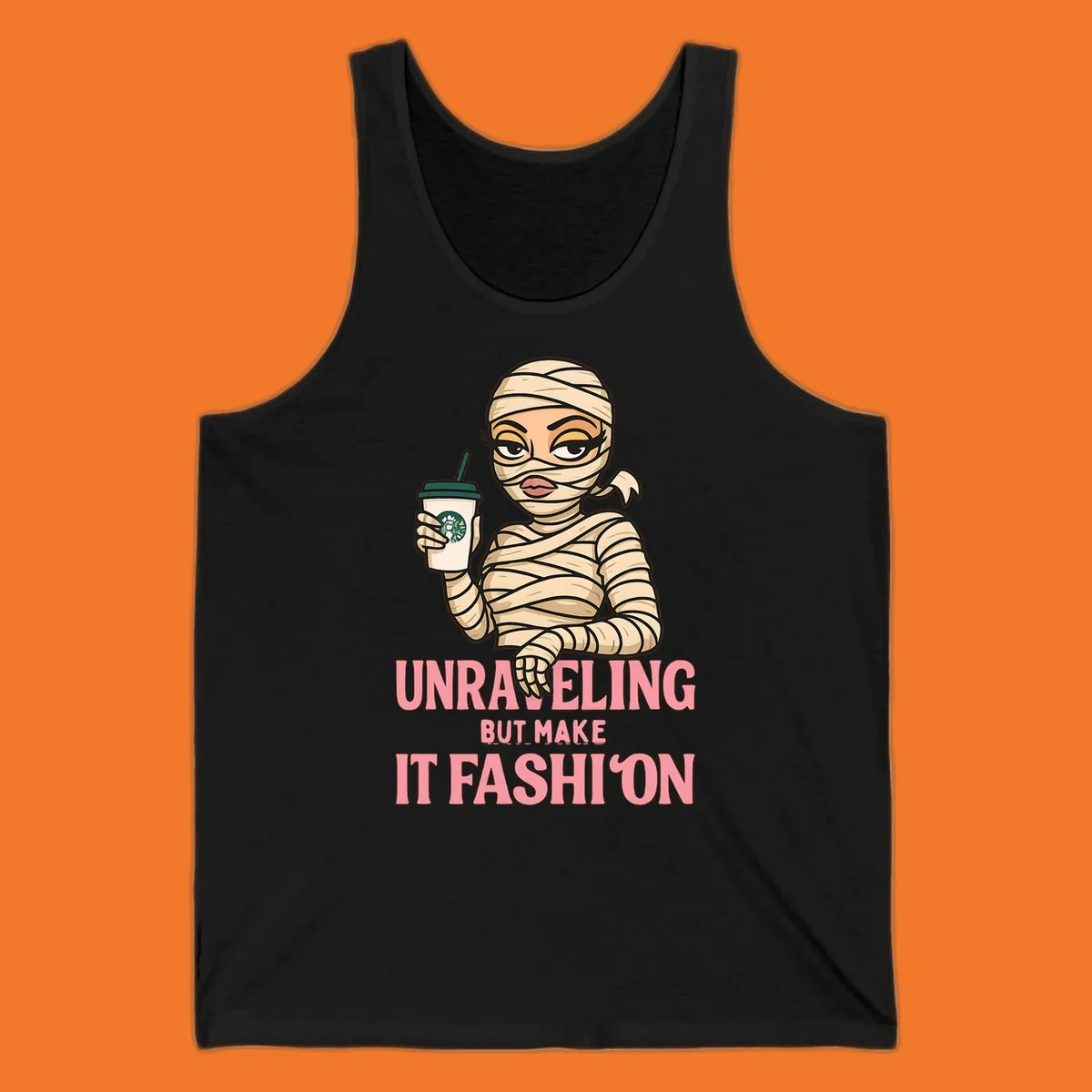 Mummy holding coffee cup with 'Unraveling But Make It Fashion' text. Mummy-fashion-coffee.