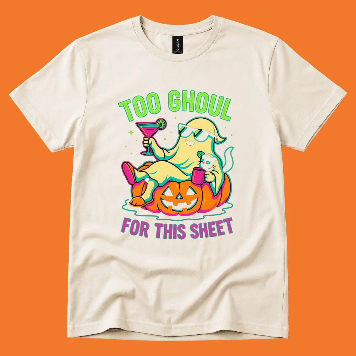 Ghost lounging on pumpkin with text 'Too Ghoul For This Sheet', Halloween design.