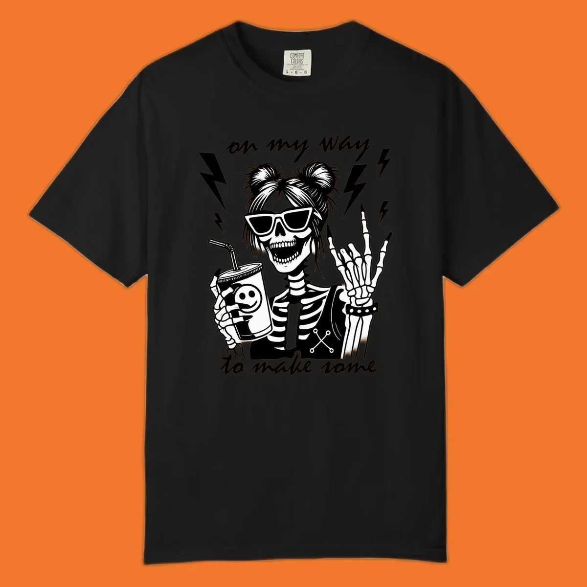 Skeleton with sunglasses and drink making rock-on gesture, text 'on my way to make some', lightning bolts. Skeleton party time.