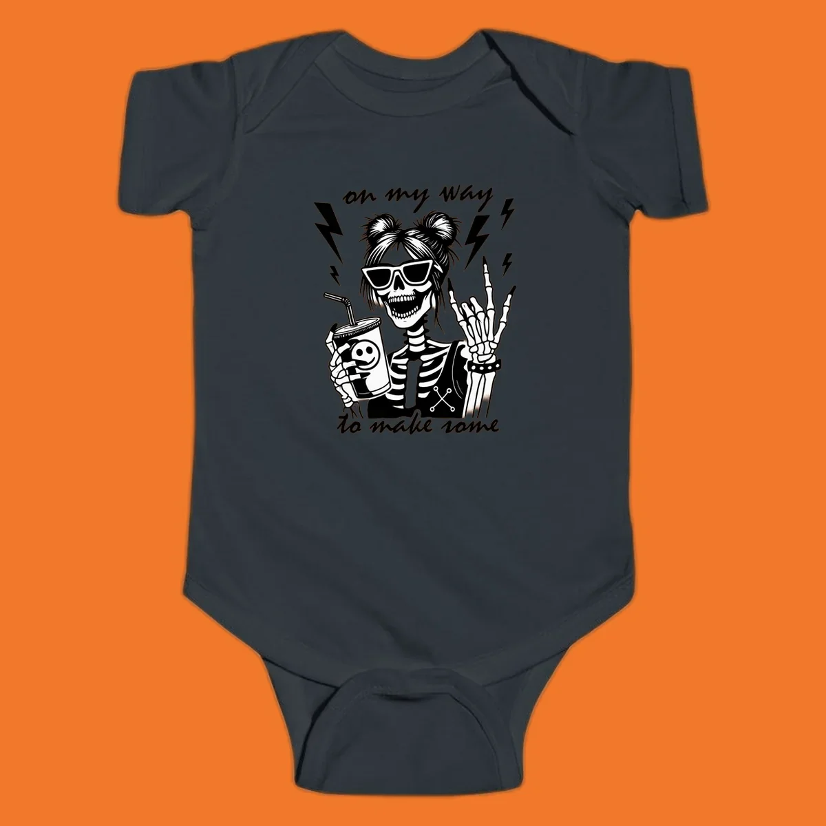Skeleton with sunglasses and drink making rock-on gesture, text 'on my way to make some', lightning bolts. Skeleton party time.