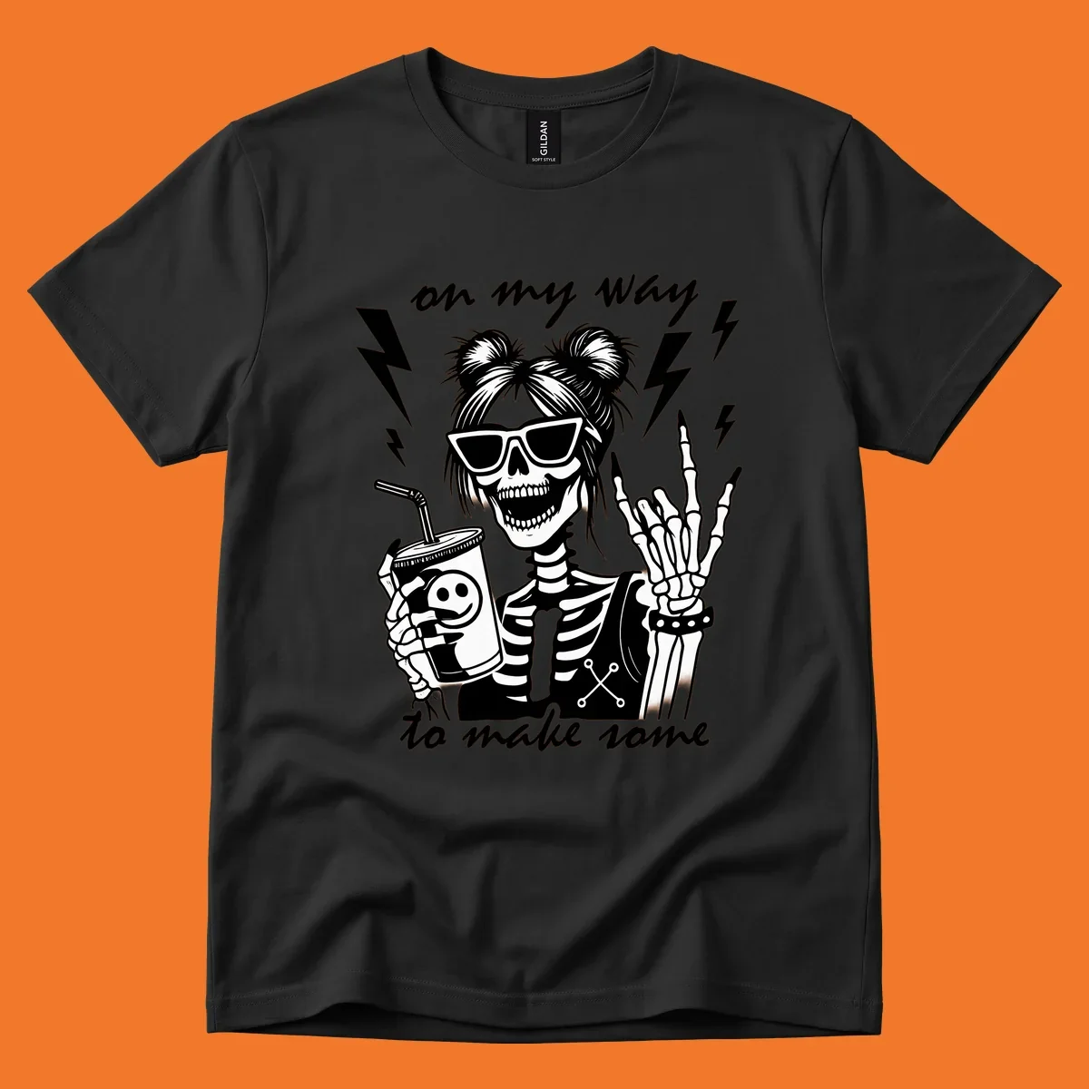 Skeleton with sunglasses and drink making rock-on gesture, text 'on my way to make some', lightning bolts. Skeleton party time.
