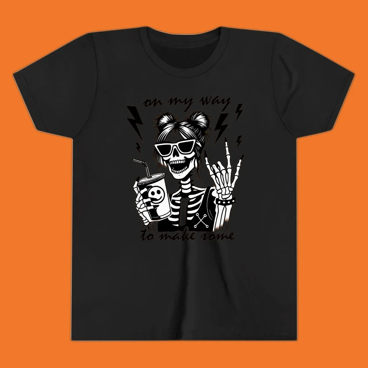Skeleton with sunglasses and drink making rock-on gesture, text 'on my way to make some', lightning bolts. Skeleton party time.
