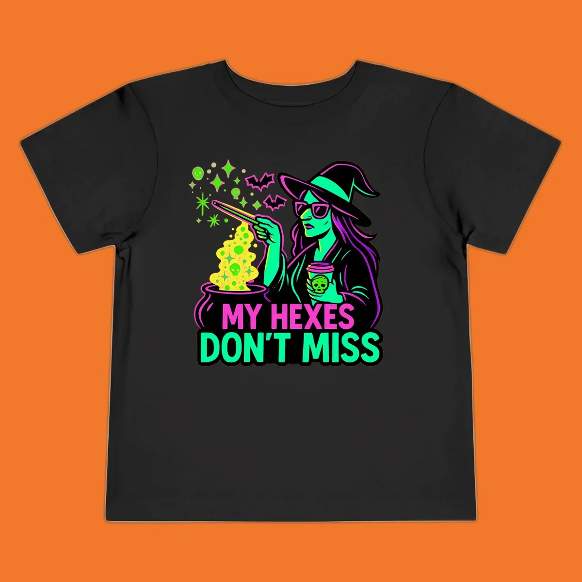 Witch with coffee and cauldron, text 'My Hexes Don't Miss'