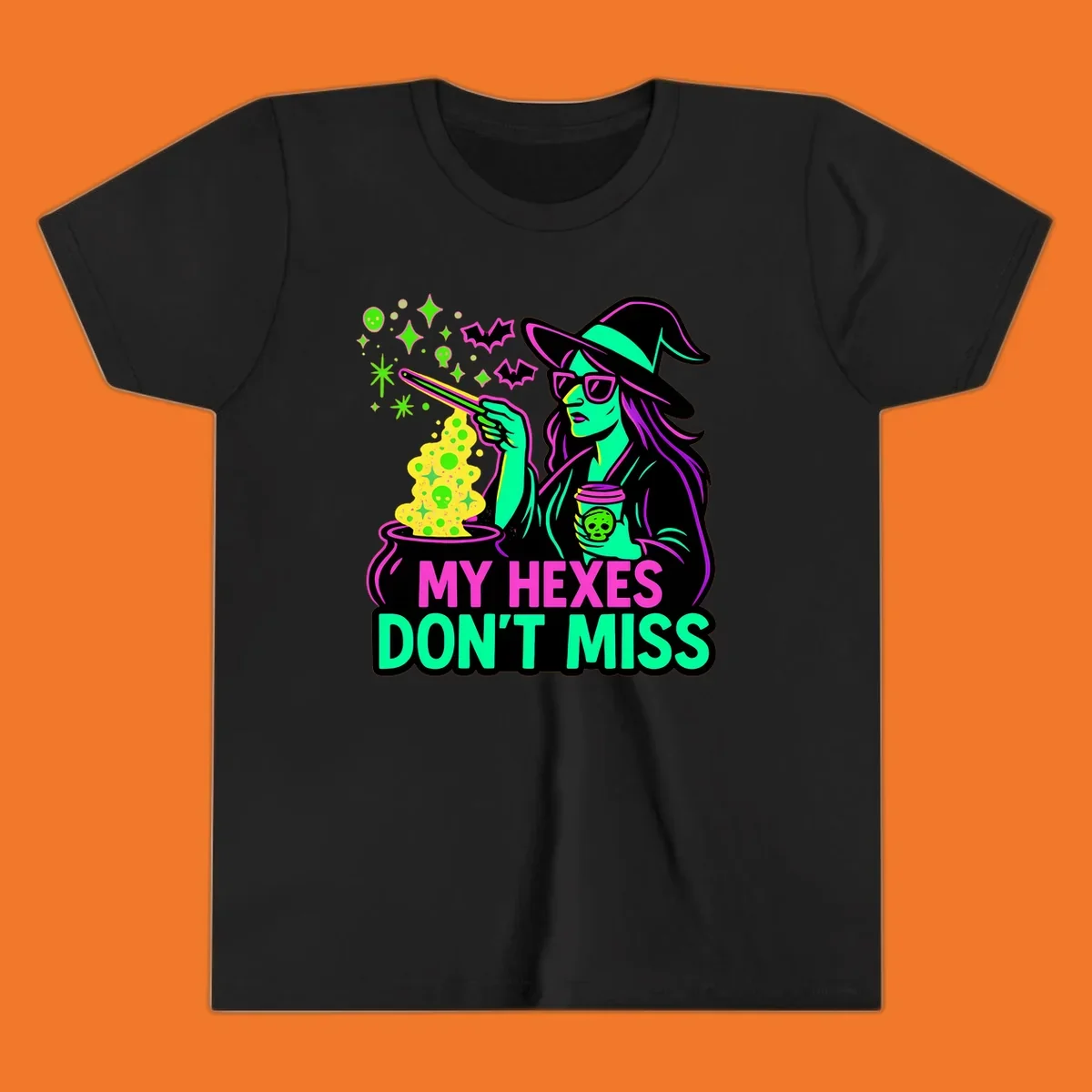 Witch with coffee and cauldron, text 'My Hexes Don't Miss'