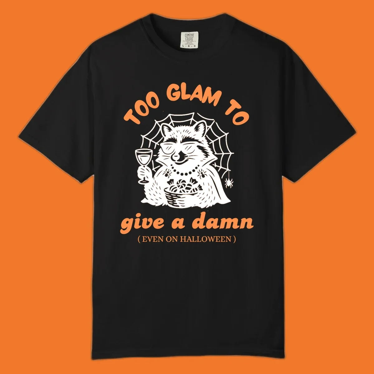 Glam raccoon with sunglasses and wine, 'Too Glam To Give A Damn' text for Halloween.
