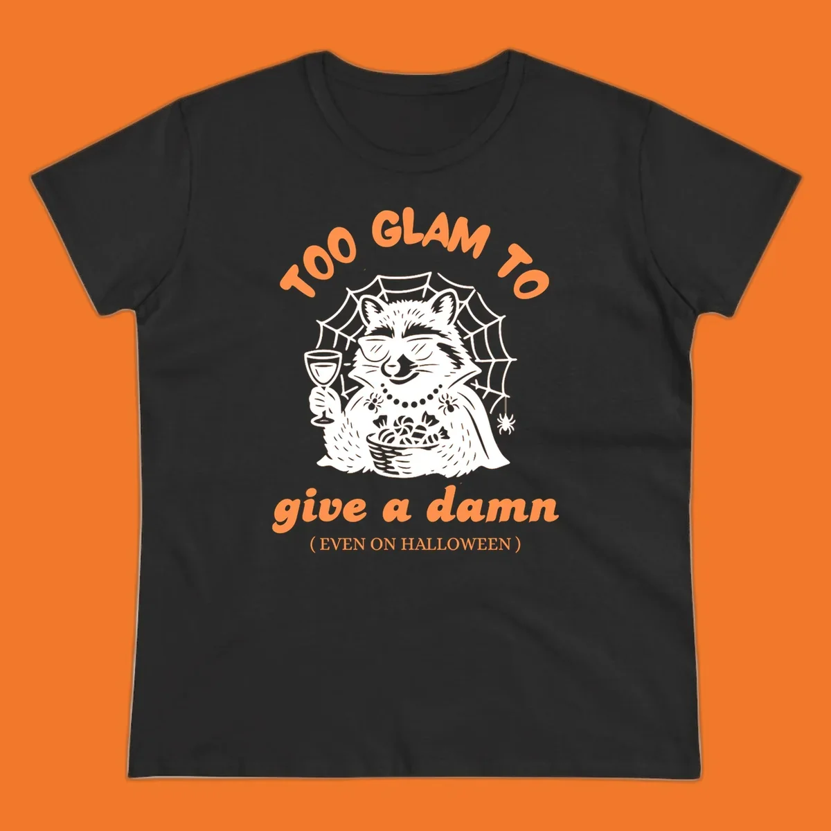 Glam raccoon with sunglasses and wine, 'Too Glam To Give A Damn' text for Halloween.