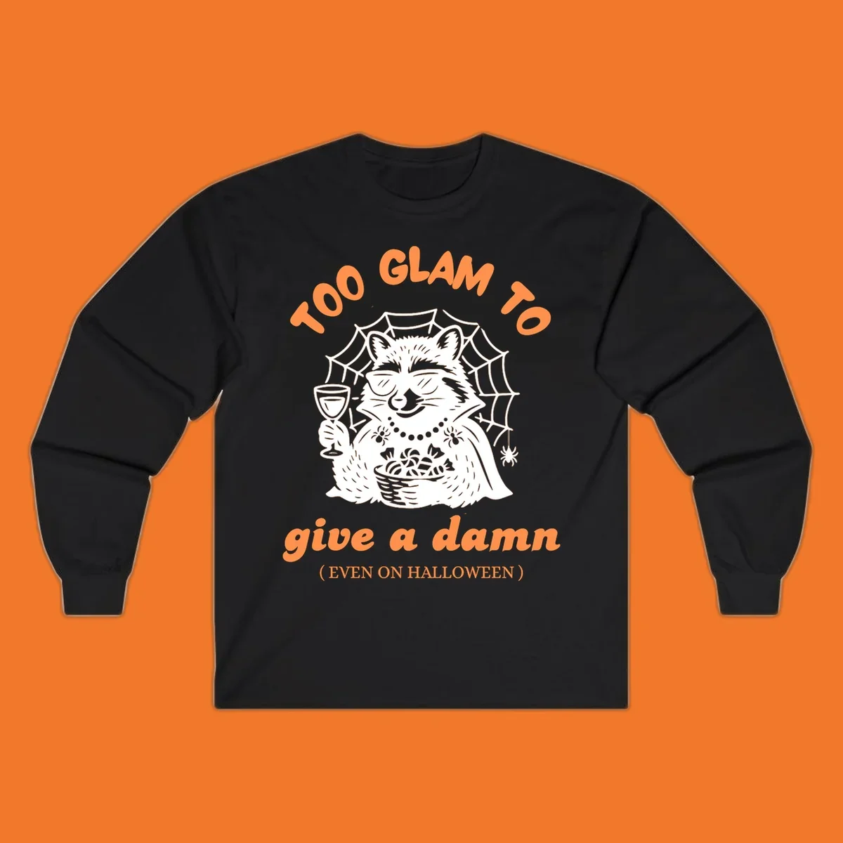 Glam raccoon with sunglasses and wine, 'Too Glam To Give A Damn' text for Halloween.