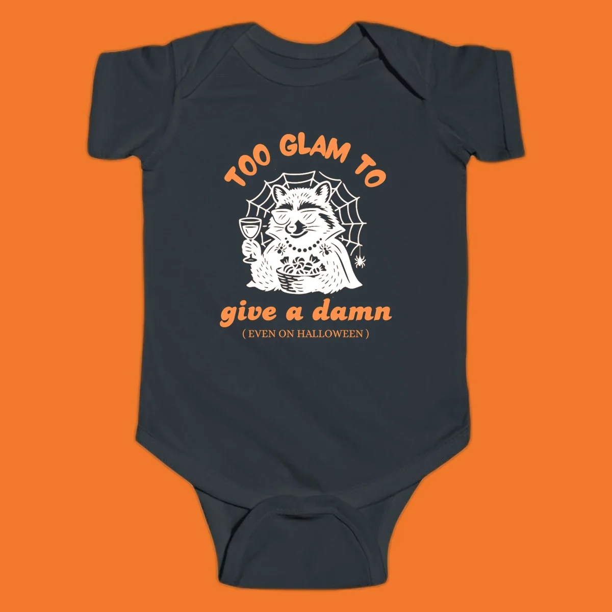 Glam raccoon with sunglasses and wine, 'Too Glam To Give A Damn' text for Halloween.