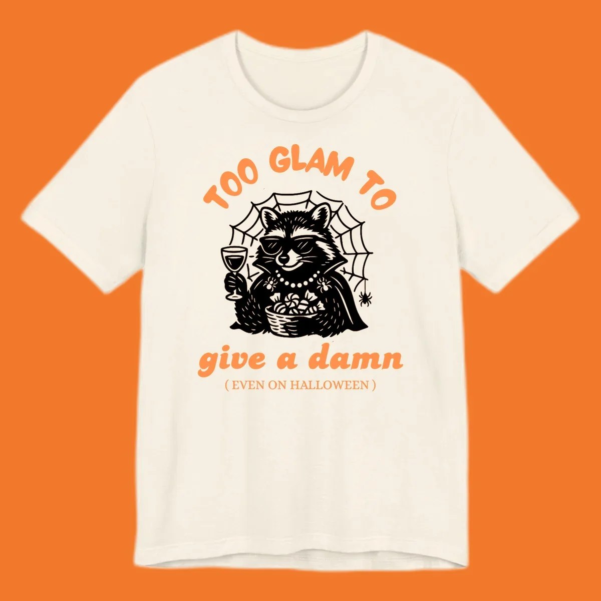 Glam raccoon with sunglasses and wine, 'Too Glam To Give A Damn' text for Halloween.