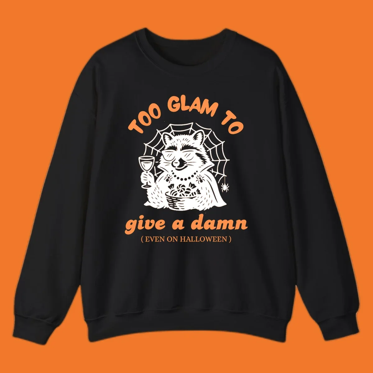Glam raccoon with sunglasses and wine, 'Too Glam To Give A Damn' text for Halloween.