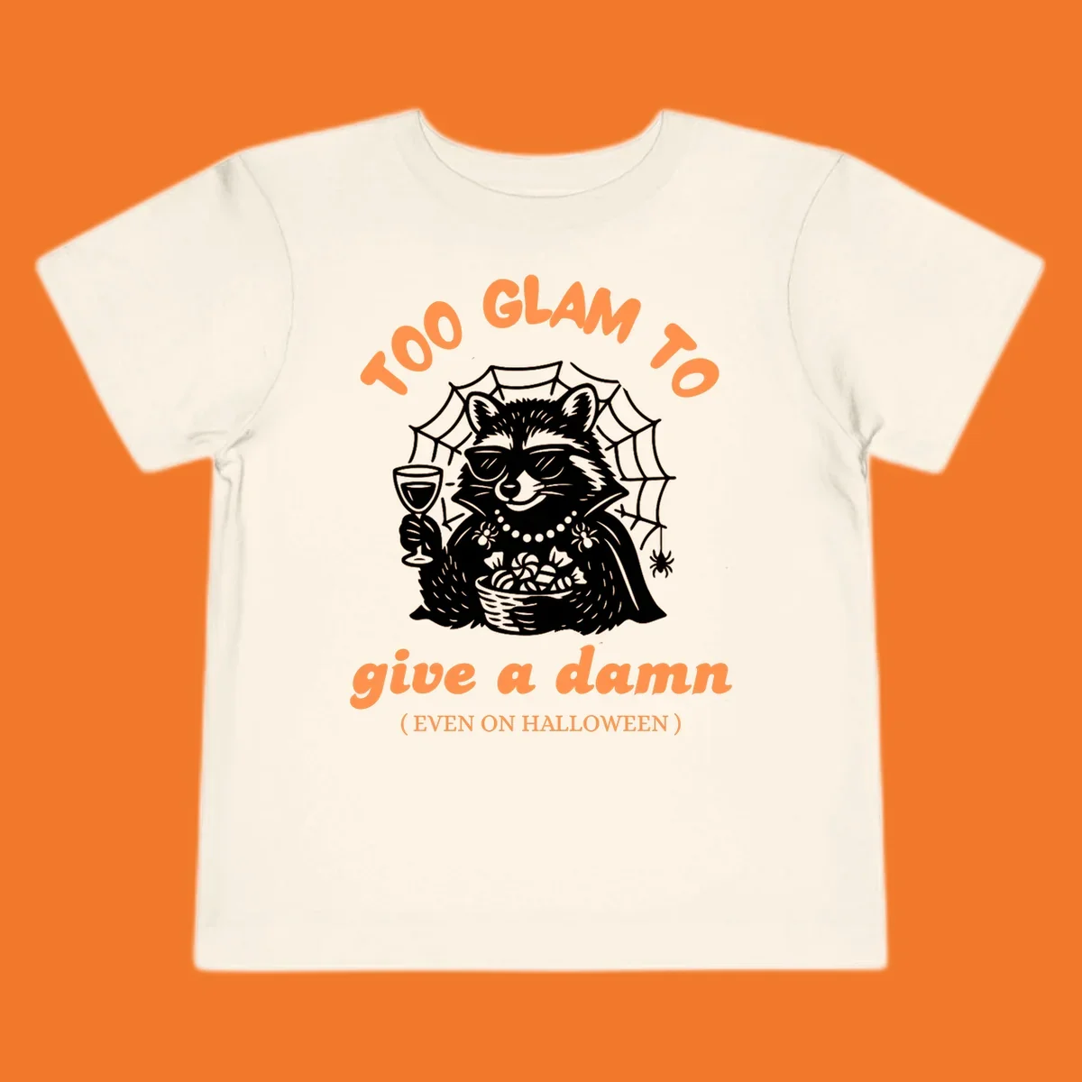 Glam raccoon with sunglasses and wine, 'Too Glam To Give A Damn' text for Halloween.