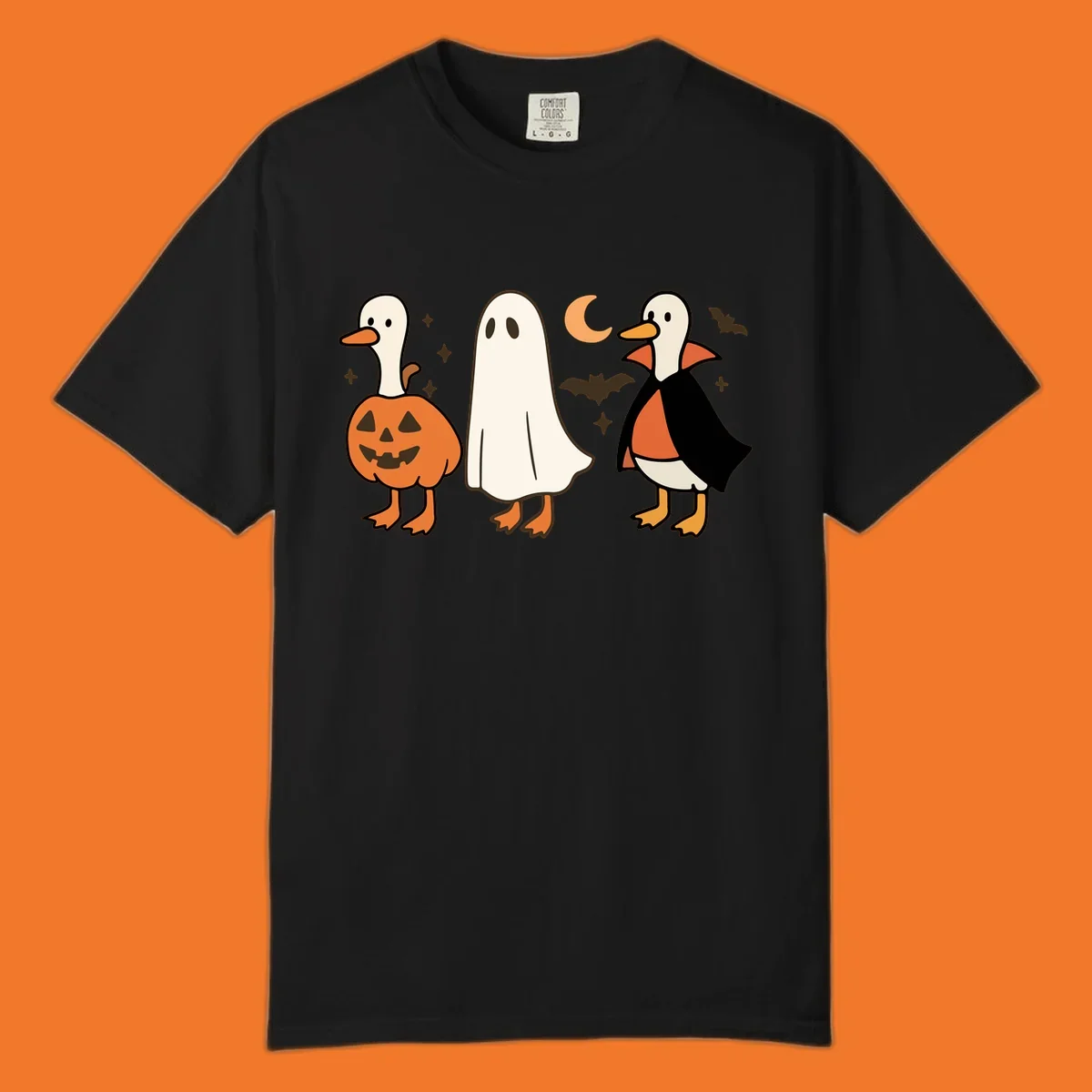 Halloween duck costumes: pumpkin, ghost, and vampire, with moon and bats. Halloween-duck-costumes.