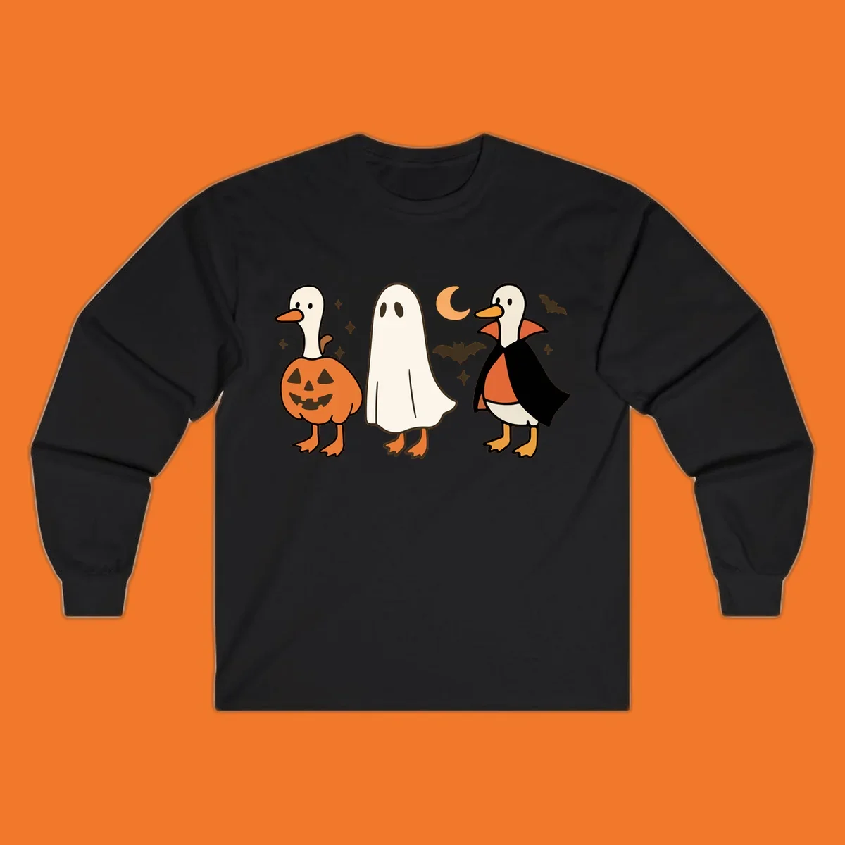 Halloween duck costumes: pumpkin, ghost, and vampire, with moon and bats. Halloween-duck-costumes.