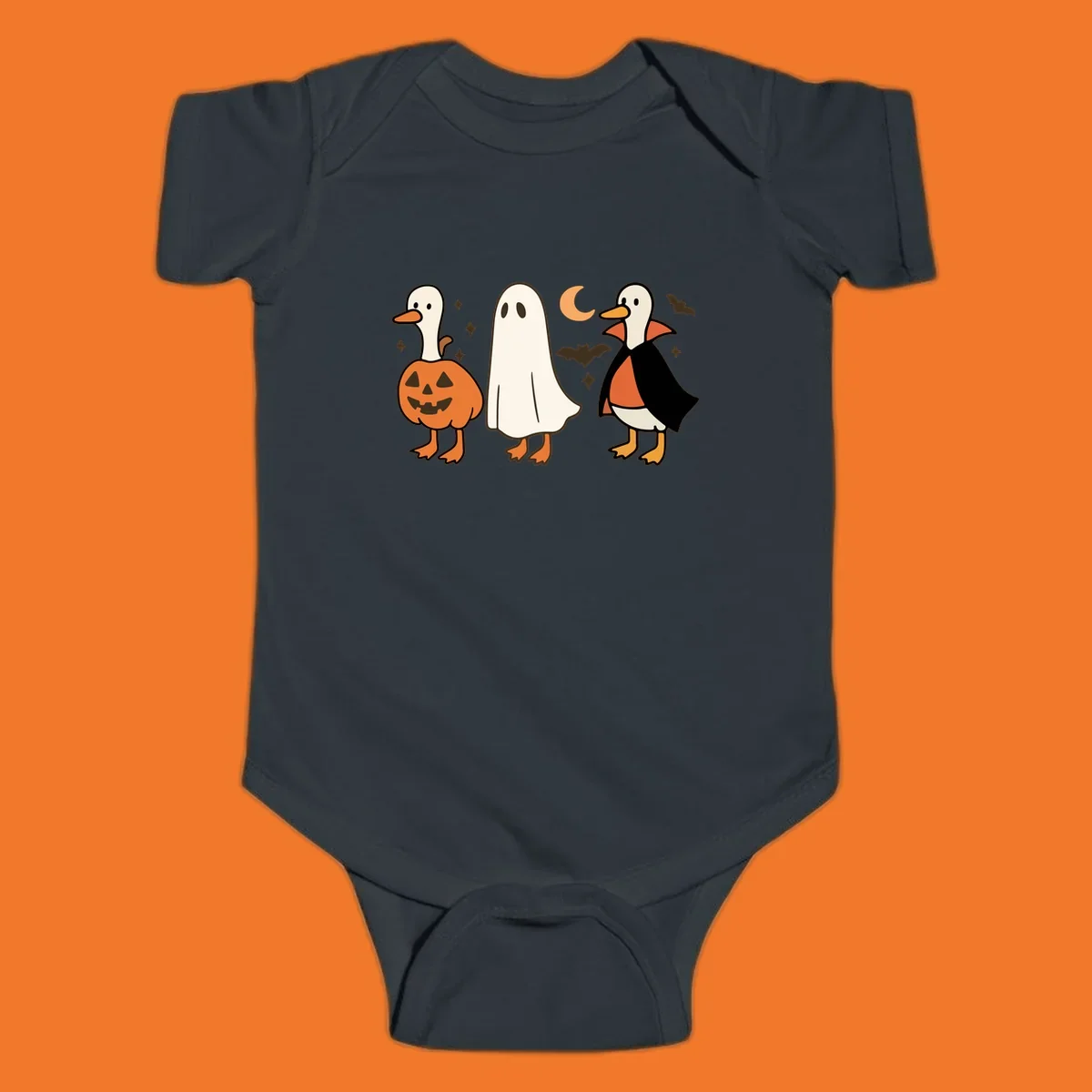 Halloween duck costumes: pumpkin, ghost, and vampire, with moon and bats. Halloween-duck-costumes.
