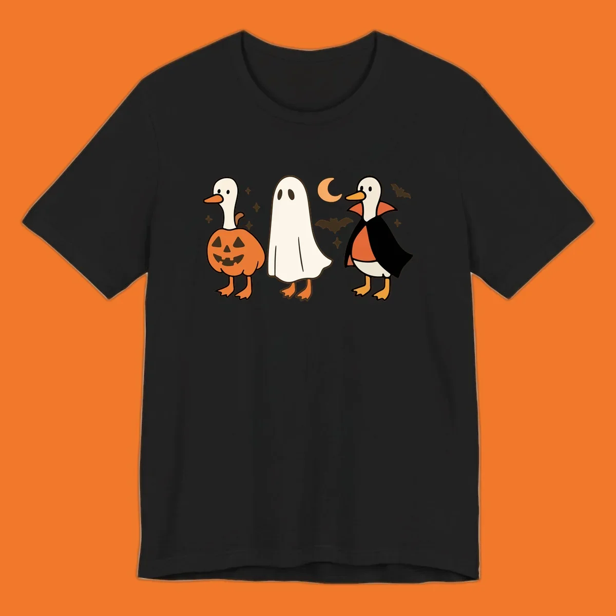 Halloween duck costumes: pumpkin, ghost, and vampire, with moon and bats. Halloween-duck-costumes.