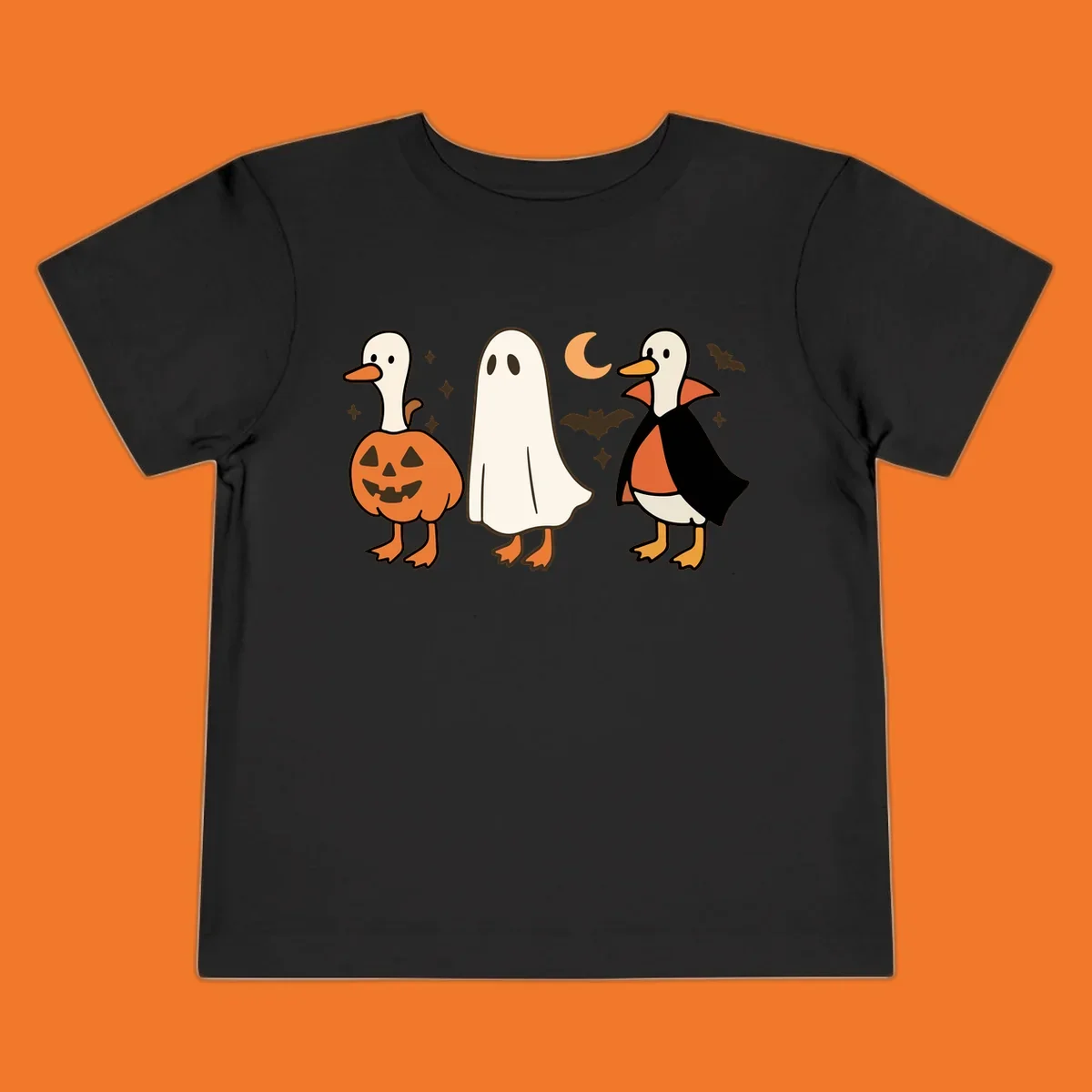 Halloween duck costumes: pumpkin, ghost, and vampire, with moon and bats. Halloween-duck-costumes.