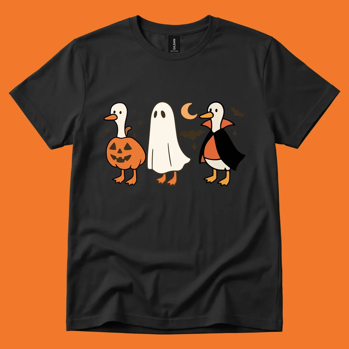 Halloween duck costumes: pumpkin, ghost, and vampire, with moon and bats. Halloween-duck-costumes.