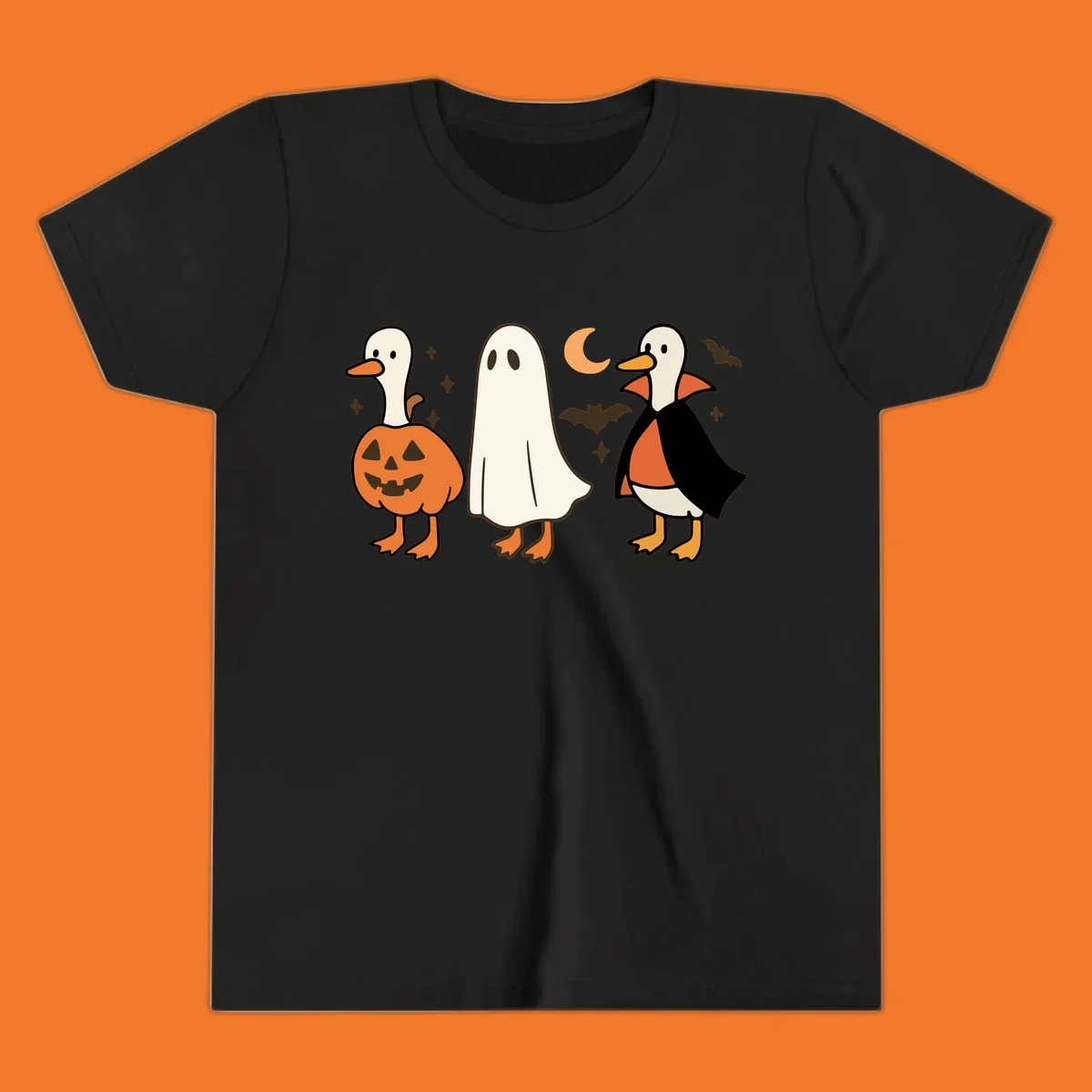 Halloween duck costumes: pumpkin, ghost, and vampire, with moon and bats. Halloween-duck-costumes.